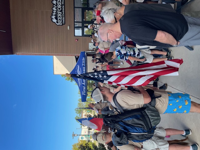 Participants with weighted rucks lining up outside Beerforest at the start line